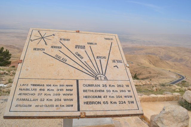Sign from viewing platform. We could easily see the Dead Sea. Jerusalem is visible on a clear day.